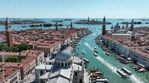 Aerial view of venice grand canal with santa maria della salute church and historic building in italy 4k video