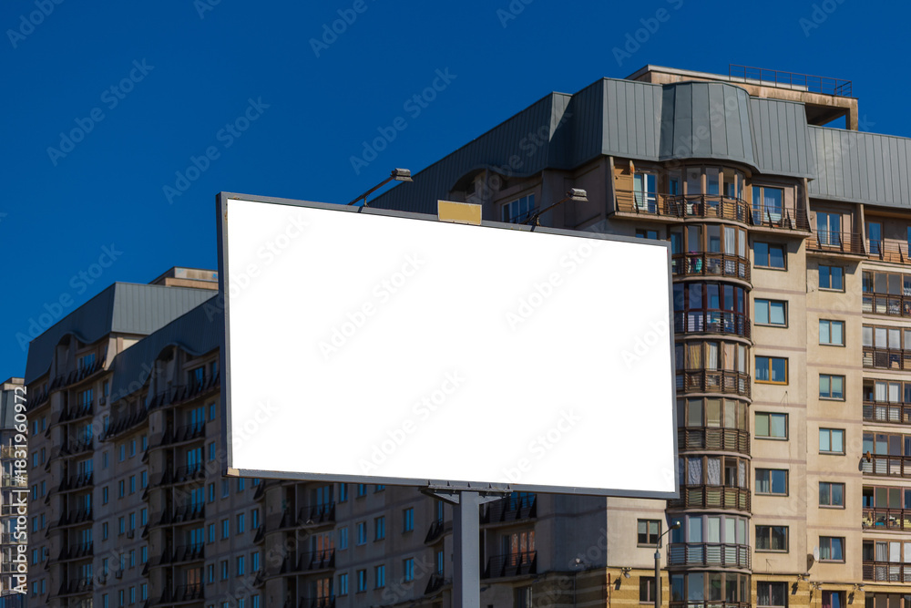 Obraz premium Background for design, white billboards on city streets and along roads in the summer day