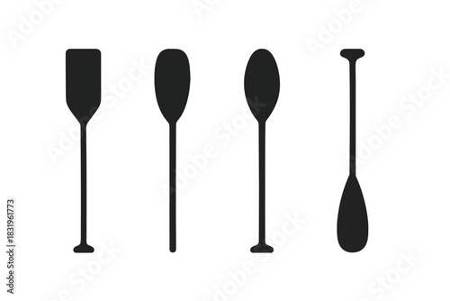 Various types of paddles displayed against a plain background highlighting their unique shapes and designs