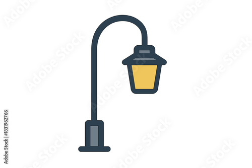 Vintage street lamp design illuminated at dusk in a quiet neighborhood