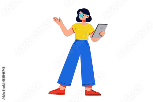 Stylish woman in yellow shirt and blue pants holding a tablet