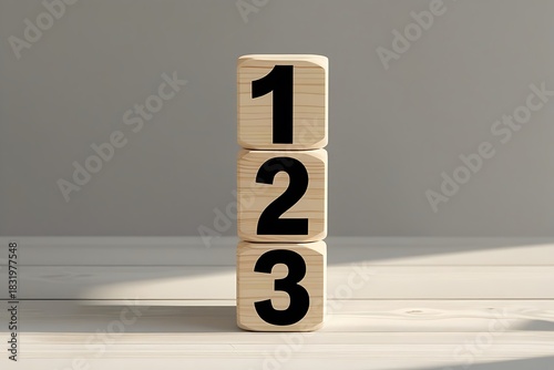 Wooden Blocks with Numbers 1 2 3 Stacked on Table Minimal Concept of Step by Step Progress Sequence Order Education Growth Strategy Idea