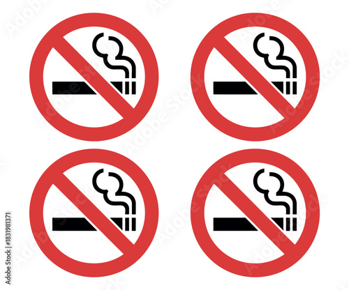 Four no smoking signs with red circles and black cigarettes on a white background