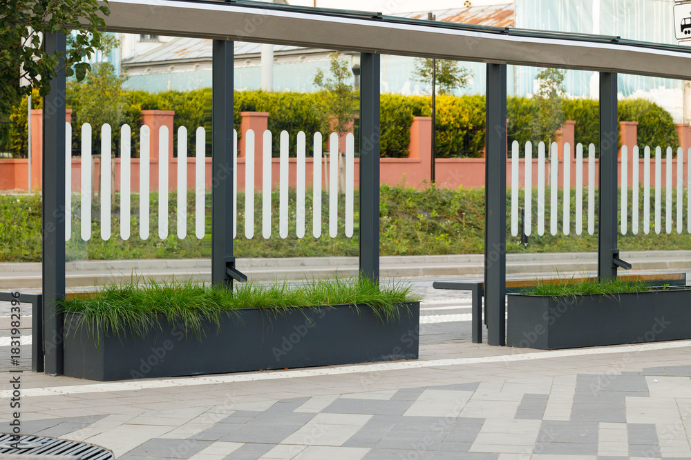 Fototapeta premium modern city street square bus and train stop landmark landscaped space design pavement floor pattern outdoor view