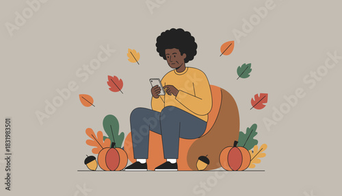 Relaxed person uses a smartphone in a cozy autumnal setting surrounded by pumpkins and fall leaves