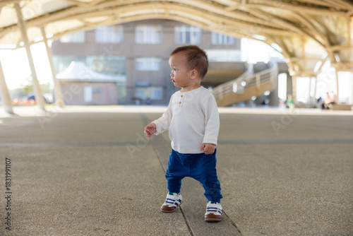 Baby exploring outdoors enjoying fresh air and nature