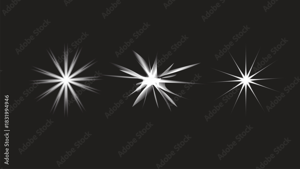 Fototapeta premium Three bright white light burst effects on a dark