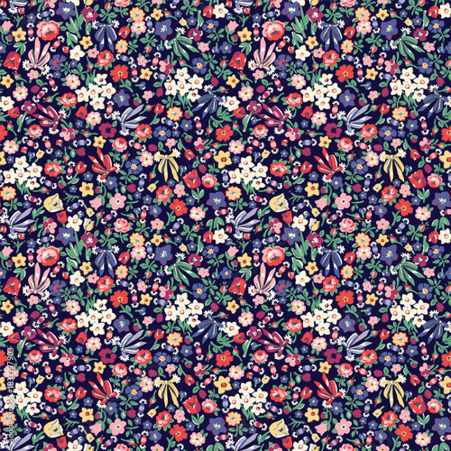 Meadow seamless pattern with vibrant wildflowers and leaves