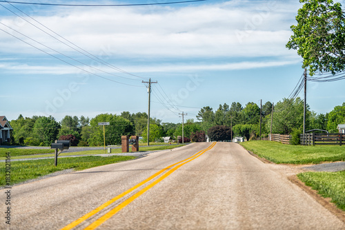 Fototapeta Naklejka Na Ścianę i Meble -  Lyndhurst, Virginia rural countryside village town in Augusta county with farm house buildings by road highway street at Blue Ridge mountains