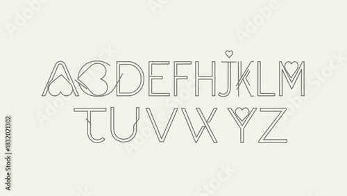 A stylized alphabet featuring decorative hearts integrated into the letterforms, presented in a light outline against a neutral background.