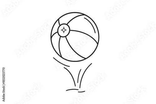 Bouncing beach ball in a playful summer scene at a sunny beach setting