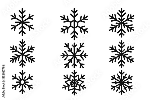 Various snowflake designs showcasing unique patterns and shapes set against a plain background