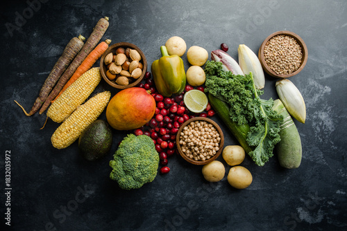 Fresh vegetables, legumes and fruits rich in vitamins — healthy vegan ingredients