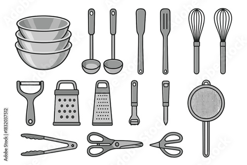 Kitchen utensils and tools arranged neatly for cooking and baking tasks in a culinary setting