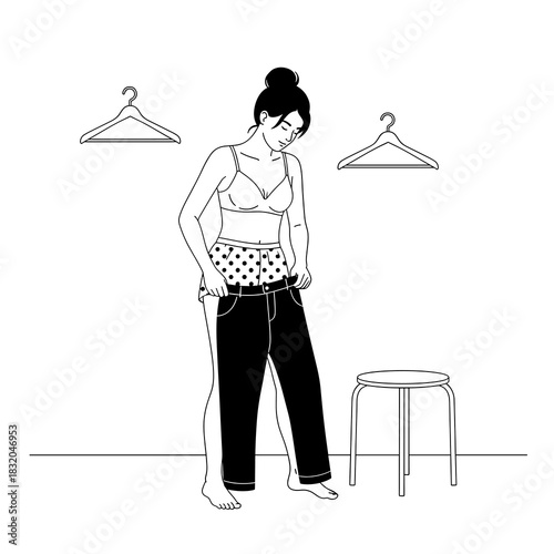 Woman trying on oversized pants, illustrating weight loss or body transformation