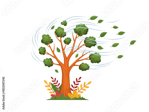 Green tree with brown trunk experiencing strong wind, leaves flying, autumn at base.
