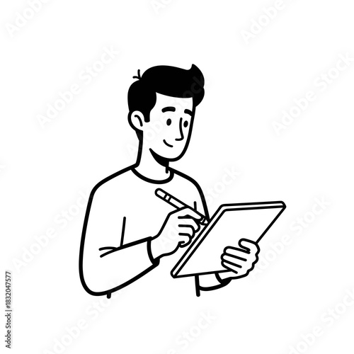 Young man using a digital tablet with stylus for drawing and creative design work