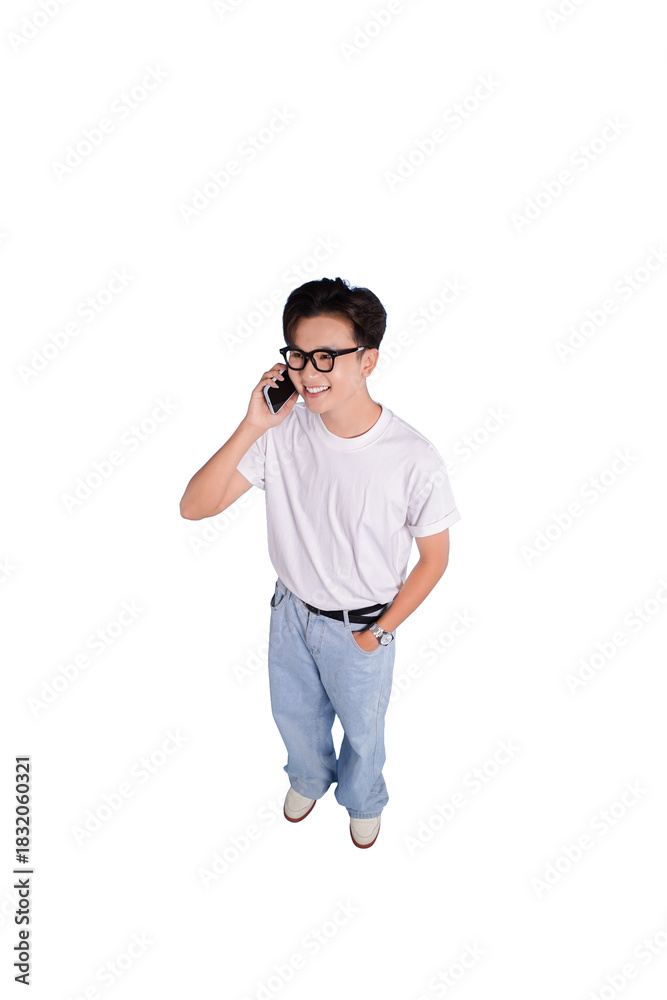Fototapeta premium On the Phone: A young, bespectacled individual engages in a lively phone call, emanating confidence and poise, showcasing the effortless intersection of communication and modernity.