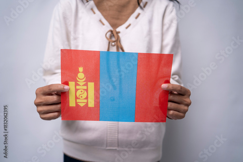 Person Proudly Holding the National Flag of Mongolia