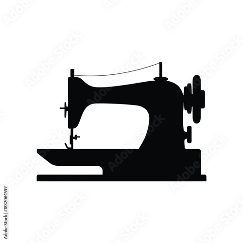 Silhouette of a vintage sewing machine on a white background