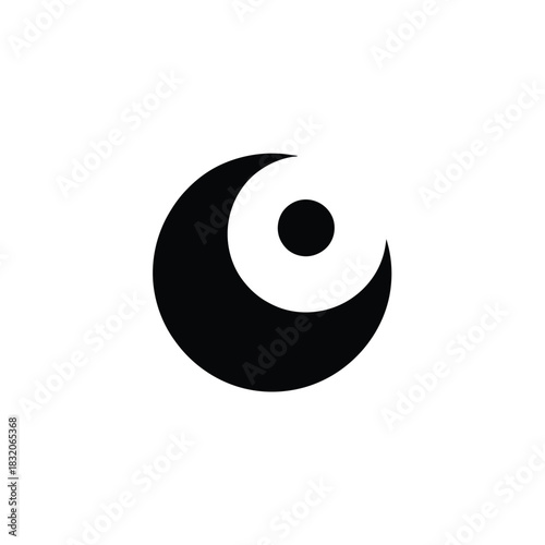 Abstract black crescent moon with a small circle inside