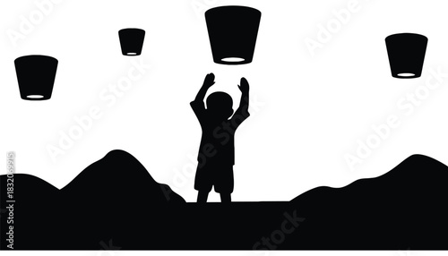 Silhouette of child releasing sky lanterns over mountains at night