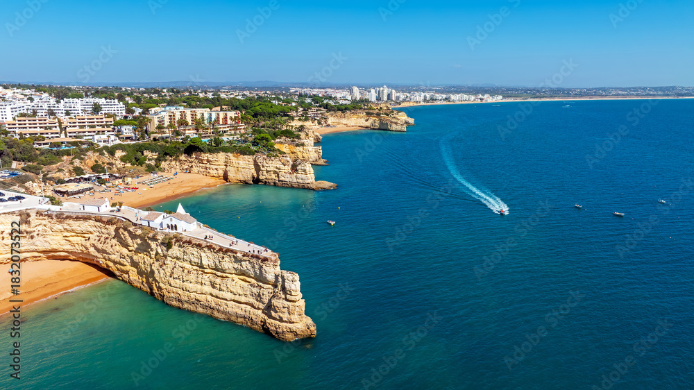 Fototapeta premium Aerial from the little church Nossa Senhora da Rocha in Armacao de Pera in the Algarve Portugal