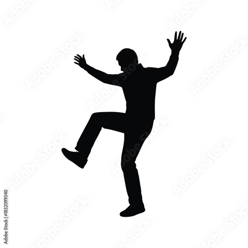 Silhouette of a man with arms raised in surprise or celebration one leg lifted