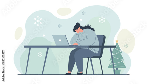 Tired woman working on laptop during winter holidays feeling stress or burnout