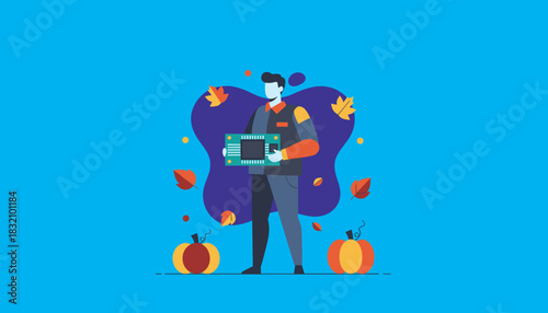 Seasonal technology update Man holding circuit board with autumn leaves and pumpkins