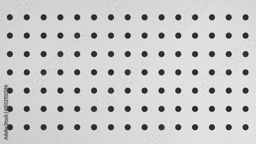 White pegboard with black holes for organization and display