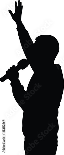 Silhouette of speaker with raised hand and microphone