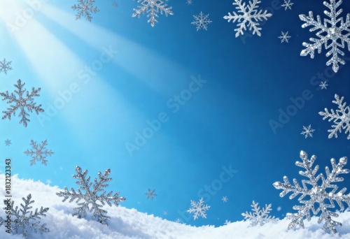 Bright winter scene with sparkling snowflakes hanging from the sky and snow-covered ground under a clear blue sky with sunlight rays