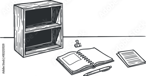 A wooden shelf with two compartments alongside a notebook, pen, and a piece of paper in a black and white sketch vector style, suitable for office and workspace design