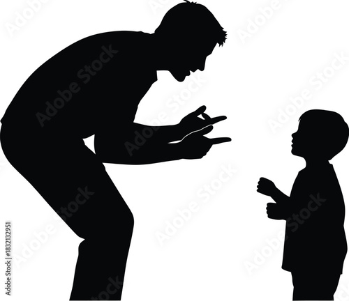 Silhouette of a father talking to a small child