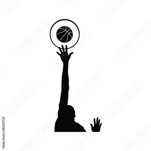 Silhouette of basketball player reaching to score with ball