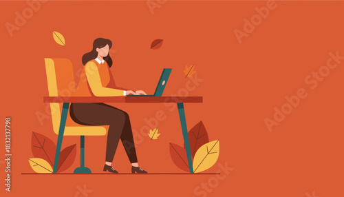 Woman working on a laptop at a desk illustrating autumn productivity and remote business tasks