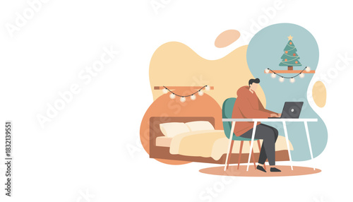 Man working from home on a laptop during the festive season in a cozy decorated bedroom