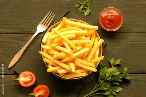 Crispy French Fries Served with Ketchup on Wooden Table
