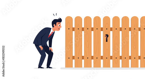 Businessman looking curiously through a fence with a lock shaped hole.