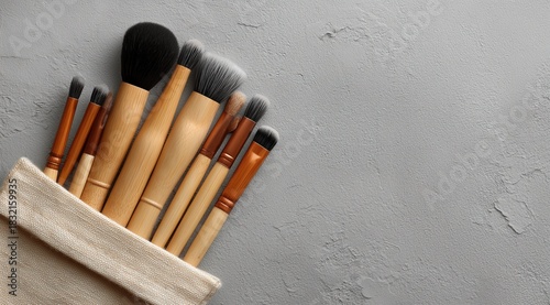 Wooden Handle Makeup Brush Set with Linen Pouch · Dark Textured Surface