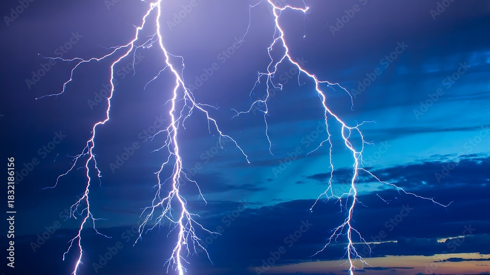 Fototapeta premium Powerful lightning bolts striking during dramatic storm in evening sky 