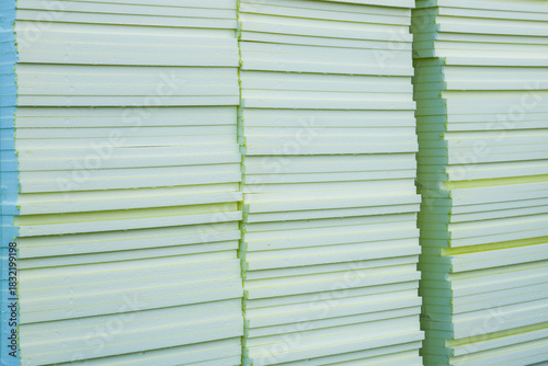 Stacked insulation foam boards at construction site ready for building thermal insulation work