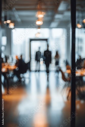 Wallpaper Mural Blurred office interior with people walking, creating a sense of movement. Torontodigital.ca