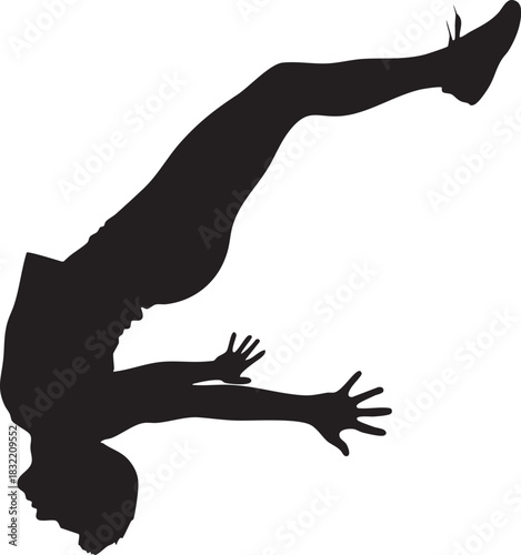 Silhouette of person doing a back handspring or acrobatic flip