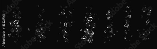 Clean water bubbles with soap foam effect, detergent trail and fresh wave on solid black background.