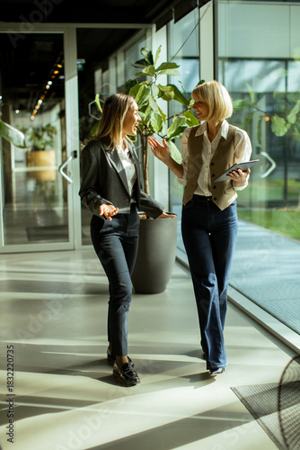 Two professionals engage in...