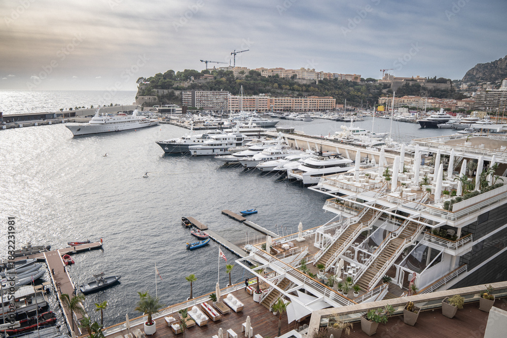 Fototapeta premium Monaco Monte Carlo Skyline with Luxury Yachts cars ans casino on the Mediterranean Coast