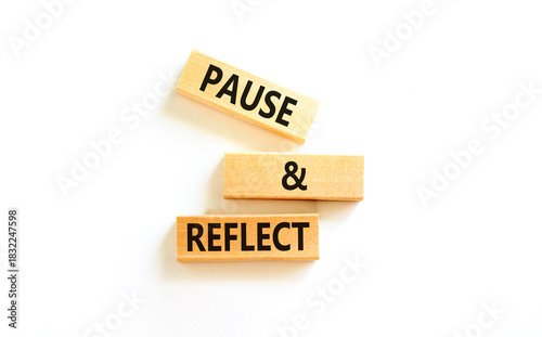 Pause and reflect symbol. Concept words Pause and reflect on beautiful block. Beautiful white table white background. Business motivational lifestyle pause and reflect concept. Copy space.