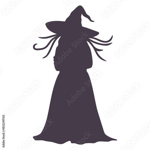 Silhouette of a witch with a pointy hat and flowing robe standing against a white background view from front